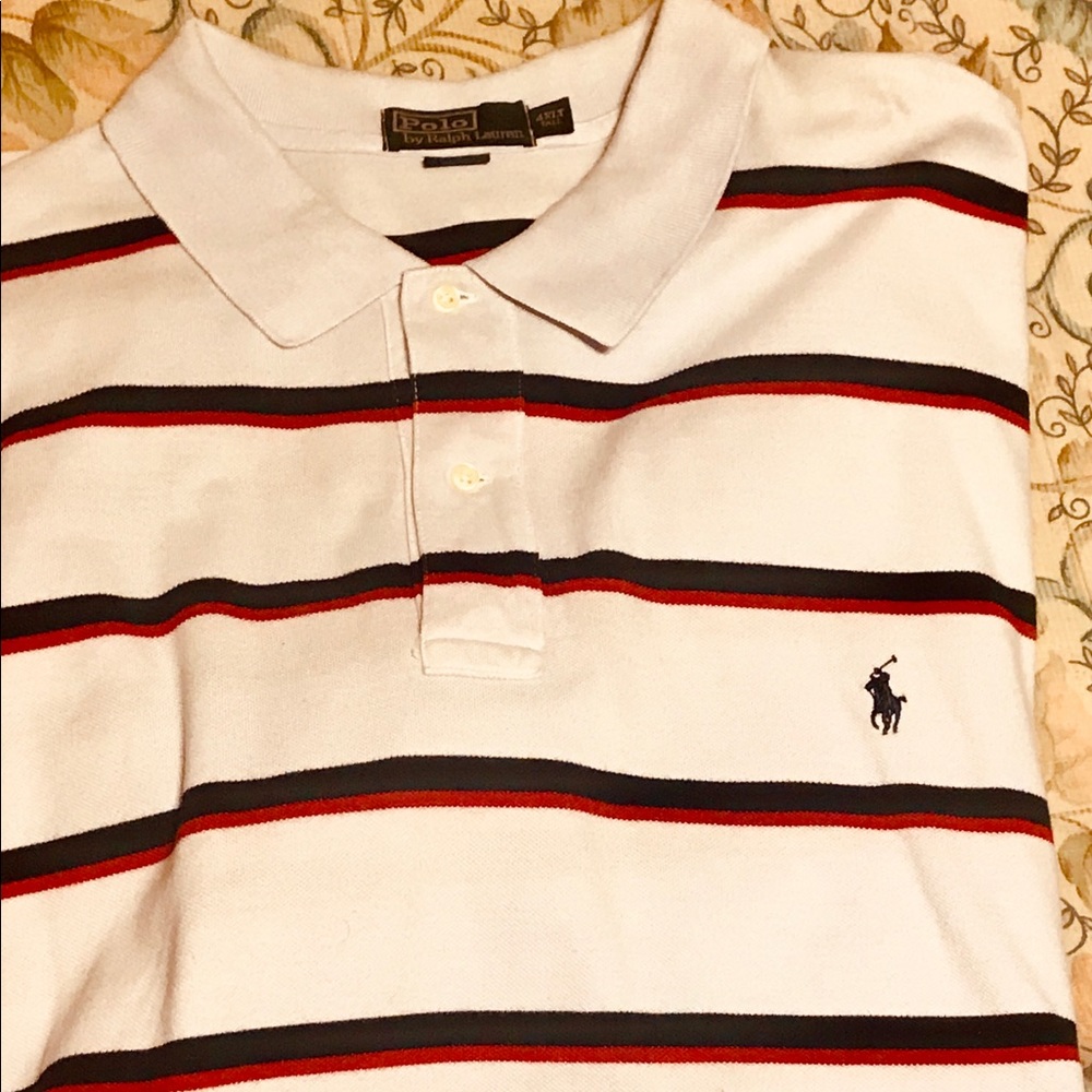 White with blue & red stripes polo. like new